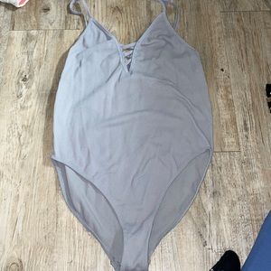 Grey body suit